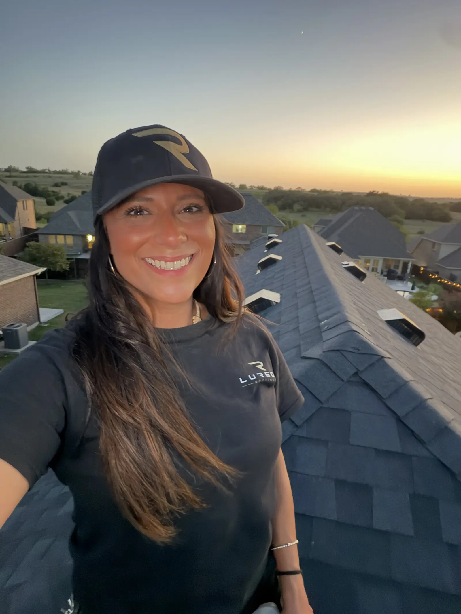 Lori Zertuche on a completed roof in Fort Worth, Texas