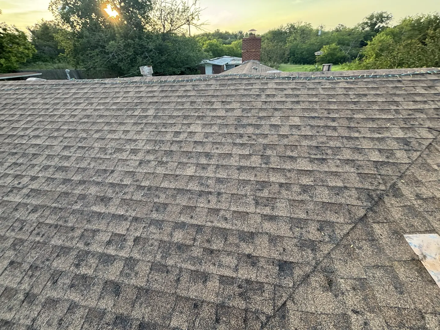 Wide view of asphalt shingles across a roof slope