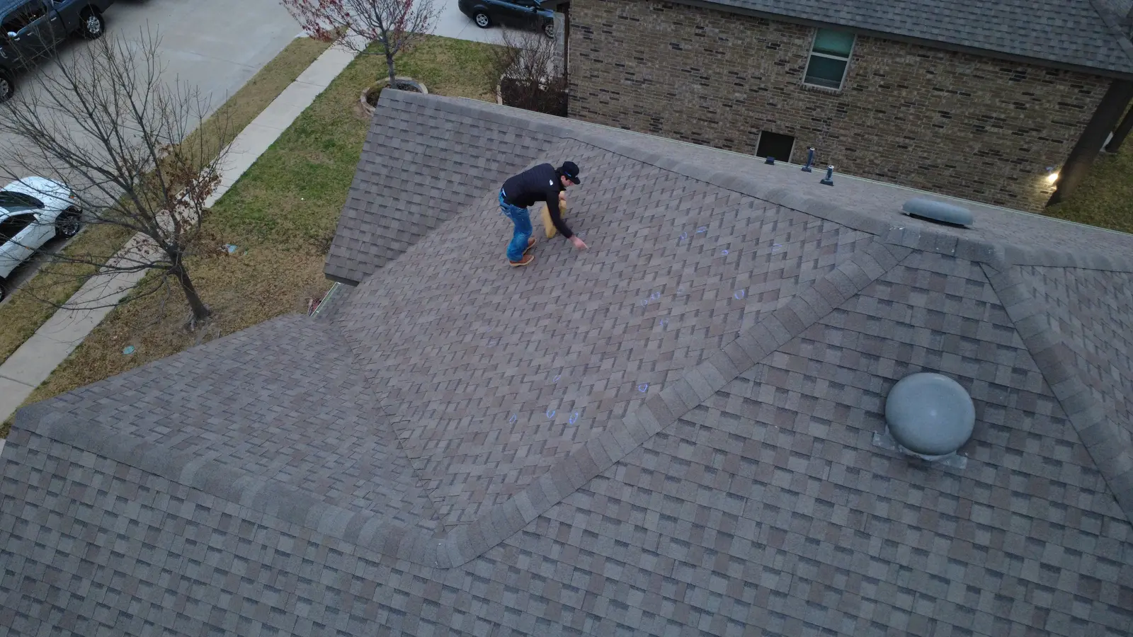 Overhead view of a roof evaluation with visible chalk markings
